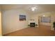 Bright living room with vaulted ceiling, fireplace, and access to other rooms at 11321 Involute Pl # 102, Raleigh, NC 27617