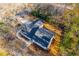 Overhead view of home showcasing roof, driveway and leafy surroundings at 2804 Edgewood Ave, Burlington, NC 27215