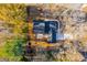 Overhead view of home showcasing roof, and lush surroundings at 2804 Edgewood Ave, Burlington, NC 27215