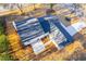 Overhead view of home showcasing roof, patio, and leafy surroundings at 2804 Edgewood Ave, Burlington, NC 27215