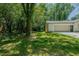 A spacious backyard offers plenty of room for outdoor activities, enhanced by a detached garage at 2804 Edgewood Ave, Burlington, NC 27215