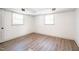 Finished basement with laminate floors, natural light and neutral paint at 2804 Edgewood Ave, Burlington, NC 27215