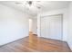 Spacious bedroom with hardwood floors, double closets, and a ceiling fan at 2804 Edgewood Ave, Burlington, NC 27215