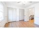 Bright bedroom with hardwood floors, large closets, and access to the hallway at 2804 Edgewood Ave, Burlington, NC 27215
