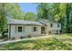 Charming two-story home featuring a freshly painted facade, well-manicured lawn, and welcoming front entrance at 2804 Edgewood Ave, Burlington, NC 27215