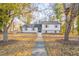 Charming home with a welcoming walkway and manicured lawn at 2804 Edgewood Ave, Burlington, NC 27215