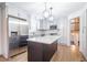 Modern kitchen with stainless steel appliances, island, and ample storage at 2804 Edgewood Ave, Burlington, NC 27215
