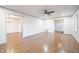Bright living room with hardwood floors, neutral walls, and an open layout to other rooms at 2804 Edgewood Ave, Burlington, NC 27215