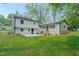 The property features a well-maintained backyard and a covered patio area, perfect for outdoor entertaining at 2804 Edgewood Ave, Burlington, NC 27215