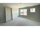 Spacious bedroom with natural light from windows and doors at 478 Traditions Grande Blvd # 32, Wake Forest, NC 27587