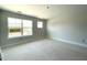 Bright bedroom with large windows offering lots of natural light at 478 Traditions Grande Blvd # 32, Wake Forest, NC 27587