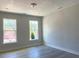 Spacious living room with recessed lighting, large windows and light wood flooring at 478 Traditions Grande Blvd # 32, Wake Forest, NC 27587