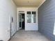 Covered patio with access to the interior, perfect for outdoor relaxation at 478 Traditions Grande Blvd # 32, Wake Forest, NC 27587