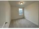 Cozy bedroom with soft carpeting and ample natural light at 482 Traditions Grande Blvd # 30, Wake Forest, NC 27587
