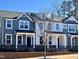 New townhomes feature modern design with brick accents and individual entryways at 482 Traditions Grande Blvd # 30, Wake Forest, NC 27587