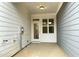 A covered back patio featuring a light fixture at 482 Traditions Grande Blvd # 30, Wake Forest, NC 27587