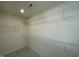 A walk-in closet with metal shelving at 482 Traditions Grande Blvd # 30, Wake Forest, NC 27587