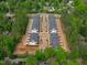 Beautiful aerial view of townhomes showing the property's layout and surrounding greenery at 6420 Tanner Oak Ln, Raleigh, NC 27613