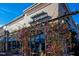 Exterior of the Brier Creek Beer Garden with lush foliage and outdoor seating at 6420 Tanner Oak Ln, Raleigh, NC 27613