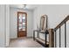 Entryway with hardwood floors and a console table at 6420 Tanner Oak Ln, Raleigh, NC 27613