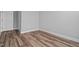 Bedroom with hardwood flooring, neutral paint, and ample natural light at 703 Jamescroft Way, Rolesville, NC 27587