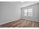 Bedroom with a window providing natural light and neutral walls at 703 Jamescroft Way, Rolesville, NC 27587