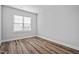 Comfortable bedroom featuring a window for natural light and neutral paint at 703 Jamescroft Way, Rolesville, NC 27587
