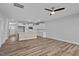 Open concept floorplan, with a kitchen with a center island flowing into a large living space at 703 Jamescroft Way, Rolesville, NC 27587