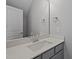 A modern bathroom with a vanity, quartz countertop and chrome faucet at 707 Jamescroft Way, Rolesville, NC 27587