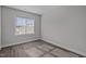 Bright bedroom with modern flooring and large window allowing ample natural light at 707 Jamescroft Way, Rolesville, NC 27587