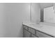 Bathroom featuring a single vanity with chrome faucet and an expansive mirror at 709 Jamescroft Way, Rolesville, NC 27587