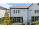Exterior rear view of the home with a sliding glass door and patio area at 709 Jamescroft Way, Rolesville, NC 27587