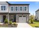 Charming home featuring a one-car garage, well-maintained landscaping, and a welcoming front entrance at 709 Jamescroft Way, Rolesville, NC 27587