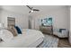 Spacious main bedroom with neutral walls, a queen bed, and a decorative mirrored dresser at 709 Jamescroft Way, Rolesville, NC 27587
