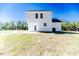Back of home with covered patio and spacious backyard at 806 Roberts Rd, Sanford, NC 27332