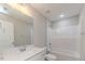 This bathroom features a shower/tub, a white vanity, and a large mirror at 806 Roberts Rd, Sanford, NC 27332