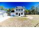 Charming two-story home with white siding, black shutters, and manicured lawn at 806 Roberts Rd, Sanford, NC 27332