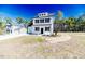 Charming two-story home with manicured lawn and white picket fence at 806 Roberts Rd, Sanford, NC 27332