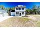 Charming two-story home with manicured lawn and white picket fence at 806 Roberts Rd, Sanford, NC 27332
