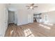 Spacious living room with wood-look floors flows into the open kitchen, creating an inviting living space at 806 Roberts Rd, Sanford, NC 27332