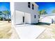Back of home with concrete patio and white siding at 806 Roberts Rd, Sanford, NC 27332