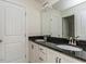 Bathroom features dual sinks, granite countertops and ample cabinet space at 8305 Cannon Grove Dr, Willow Springs, NC 27592