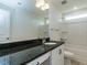 Bathroom featuring granite countertops and a shower/tub combo at 8305 Cannon Grove Dr, Willow Springs, NC 27592