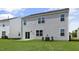 Two-story home with sliding glass door and a spacious grassy backyard at 98 Ethel Ln, Angier, NC 27501
