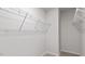 Walk-in closet featuring white wire shelving for organized storage at 98 Ethel Ln, Angier, NC 27501