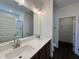 Bathroom with double sinks, walk-in shower, and plenty of counter space at 155 Waterwheel Dr, Selma, NC 27576