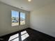 Bright bedroom featuring hardwood floors and plenty of natural light at 155 Waterwheel Dr, Selma, NC 27576