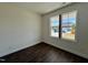 Bedroom featuring hardwood floors and a double window at 155 Waterwheel Dr, Selma, NC 27576