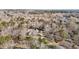 Aerial view of a secluded residence surrounded by trees, showcasing its tranquil setting at 319 Fox Hollow Dr, Clayton, NC 27527