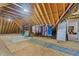 Partially finished attic area with clothing rack and closet at 319 Fox Hollow Dr, Clayton, NC 27527